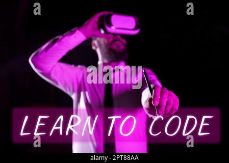 Sign displaying Learn To Code, Business idea Learn to write Software Be a Computer Programmer Coder Stock Photo