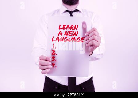 Sign displaying Learn A New Language, Conceptual photo Study Words other than the Native Mother Tongue Stock Photo