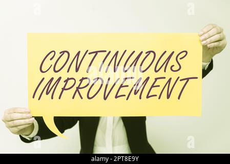 Writing displaying text Continuous Improvement, Internet Concept Ongoing Effort to Advance Never ending changes Stock Photo