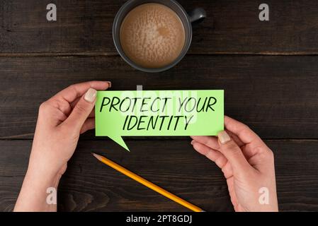 Conceptual caption Protect Your Identity, Concept meaning secure from data breach and information security Stock Photo