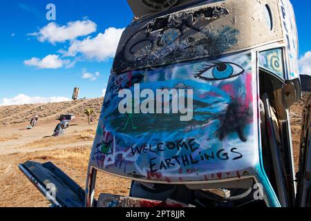 Cars sunk into the ground and sprayed with graffiti, artwork, Car-Forest, Goldfield, Nevada, USACar-Forest, Goldfield, Nevada, USA Stock Photo
