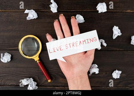 Writing displaying text Live Streaming, Business idea displaying audio or media content through digital devices Stock Photo