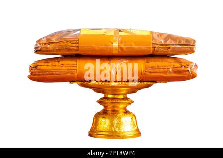 set of monk's robes placed on a pedestal on a white background isolate Stock Photo