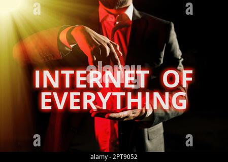 Hand writing sign Internet Of Everything, Business idea smart modern city and wireless communication network Stock Photo
