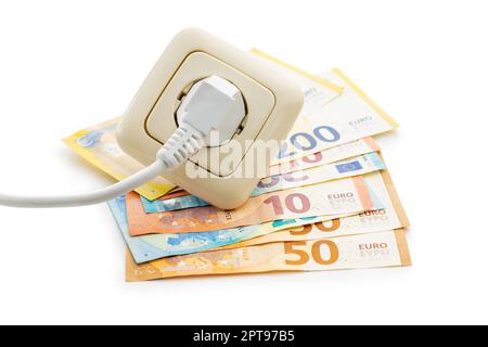 The energy savings concept with electric power plug, calculator  and euro money isolated on the white background. Stock Photo