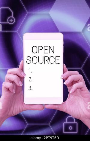 Hand writing sign Open Source, Word for contains the source code that can be modified and enhanced Stock Photo