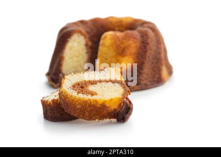 Sweet sponge cake. Bundt cake isolated on the white background. Stock Photo