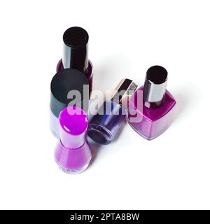 Add some purple into your beauty. Studio shot of colorful nail varnish bottles Stock Photo