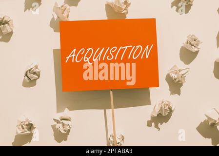 Conceptual display Acquisition, Word Written on process of forming an evaluation by discerning and comparing Important Ideas On Piece Of Wood With Mag Stock Photo