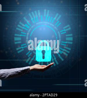 Virtual screen with padlock and hand. The concept of protecting personal information on the network. Cybersecurity and Internet technologies Stock Photo