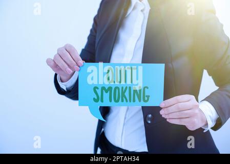 Text caption presenting Quit Smoking, Word for Discontinuing or stopping the use of tobacco addiction Stock Photo