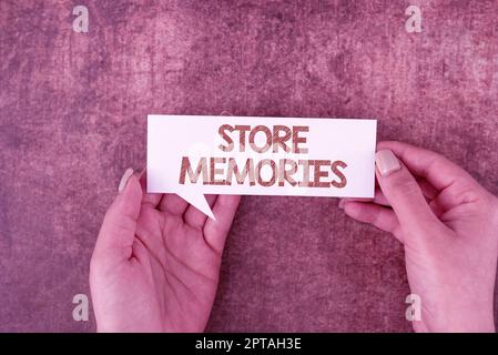 Sign displaying Store Memories, Word Written on a systematic process of envisioning a desired future Businessman Holding Speech Bubble With Important Stock Photo
