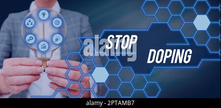 Text sign showing Stop Doping, Word Written on put an end of the viral infection of your lungs and airways Businesswoman Holding Pen And Notepad With Stock Photo