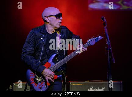 April 26, 2023, Naples, Naples, Italy: Joe Satriani at the Augusteo Theater in Naples (Italy) 2 hours of live concert with his band, Kenny AronoffÂ (drums),Â Bryan BellerÂ (bass), andÂ Rai ThistlethwayteÂ (keyboards)..Joe Satriani is one of the most prestigious figures in the history of rock music, a true pioneer, as well as an example of style for all those who have been inspired by him, Satriani is one of the most acclaimed musicians in the world, American guitarist, composer, songwriter , multiple Grammy Award nominee, originated in the golden age of guitarists, the 80s..Born in Long Island Stock Photo