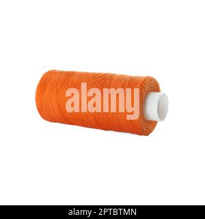 Spool of orange sewing thread isolated on white Stock Photo