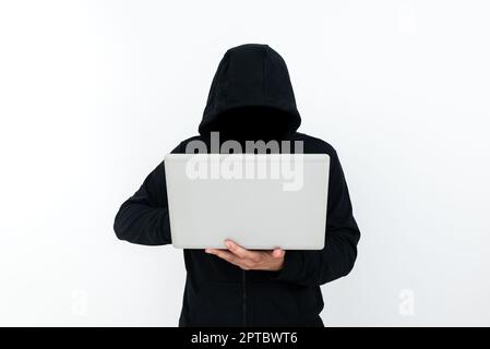 Man Standing With Laptop Presenting Cyber Security. Stock Photo