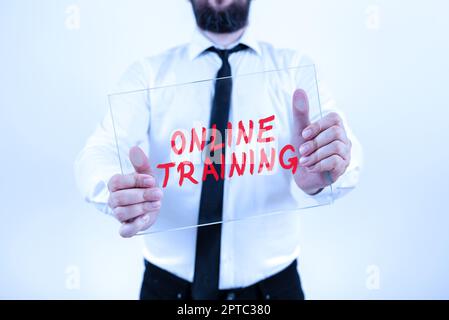 Writing displaying text Online Training, Conceptual photo certain skill is only taught and attainable on the Internet Stock Photo