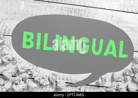 Handwriting text Bilingual, Business concept digital database containing information that can be used Notebook With Important Message On Desk With Off Stock Photo