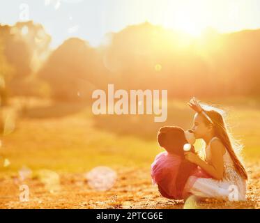 You are my best friend forever. an adorable little girl playing with her teddybear outdoors Stock Photo