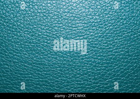 Blue colored leather surface background close up Stock Photo
