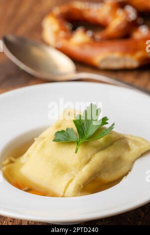 swabian maultasche in broth Stock Photo