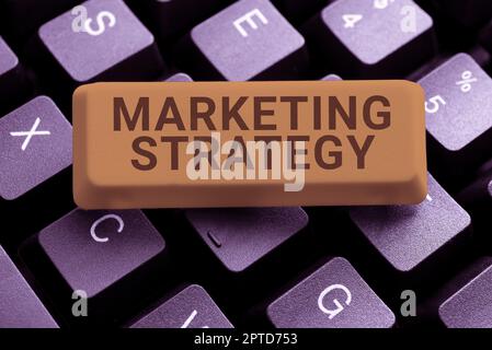 Sign displaying Marketing Strategy, Word Written on plan of action designed to promote and sell product Stock Photo