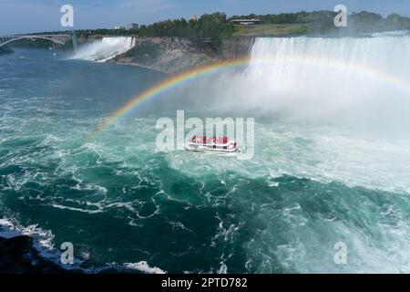 Niagara Falls - June 30, 2022: Tourists on the Hornblower Niagara Cruises at Niagara Falls, Ontario. Stock Photo