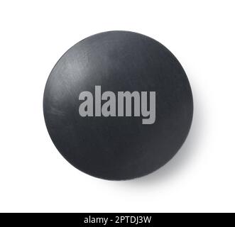 Solid soap mixed with black charcoal placed on a white background. Viewed from directly above. Stock Photo