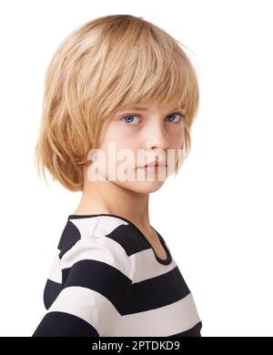 Shes a little girl who know what she wants. Portrait of a little girls standing with hands on hips against a white background Stock Photo