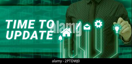 Sign displaying Time To Update, Conceptual photo System software update for enhancement or compatibility Stock Photo