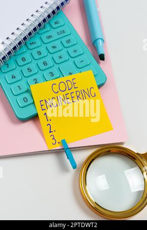 Hand writing sign Code Engineering, Business approach application of engineering to the development of software Stock Photo
