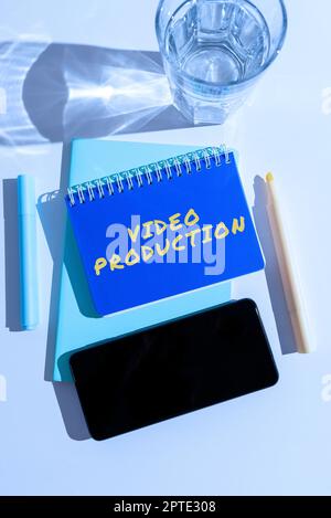 Handwriting text Video Production, Business overview program designed to protect computers from malware Computer Keyboard And Symbol.Information Mediu Stock Photo