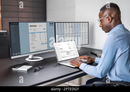 Spreadsheet Analyst Employee Worker. Medical Report On Computer Stock Photo