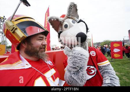 Kansas City, MO, USA. 14th Dec, 2014. Kansas City Chiefs mascot KC Wolf  sits with Oakland Raiders fans during the NFL game between the Oakland  Raiders and the Kansas City Chiefs at