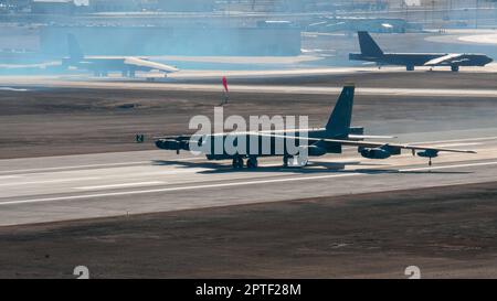 A U.S. Air Force B-52H Stratofortress assigned to the 5th Bomb Wing begins to take off as two more B-52H Stratofortresses make their way to the runway during Global Thunder 23 (GT23) at Minot Air Force Base, North Dakota, April 16, 2023. Exercises like GT23 involve extensive planning and coordination to provide unique training opportunities for assigned units and forces. (U.S. Air Force photo by Staff Sgt. Michael A. Richmond) Stock Photo