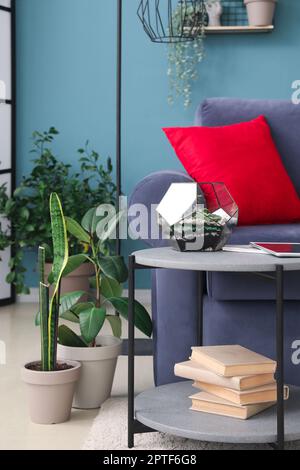 Florarium on table in living room Stock Photo