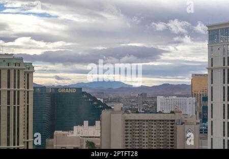 Downtown Grand Hotel and Casino and Hilton Vacation Club Polo Towers with the mountains in the distance; in Las Vegas, Nevada USA. Stock Photo