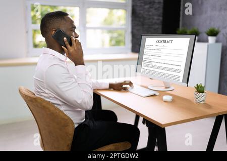 Legal Law Contract On Desktop Computer Screen Stock Photo
