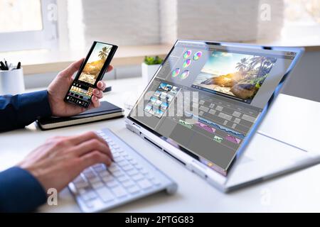Video Editor Or Designer Using Editing Software Tech On Computer Stock Photo