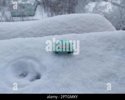 Christmas items and toys on the white snow Stock Photo