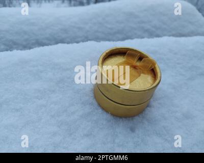 Christmas items and toys on the white snow Stock Photo