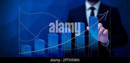 Business Man Presenting New Futuristic Growth Graphs. Stock Photo