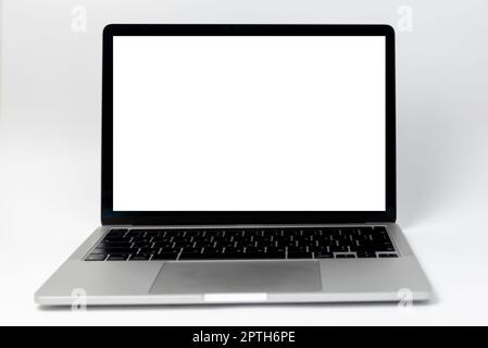 laptop computer frame with isolated white background blank screen. template presentation and advertisement. Stock Photo