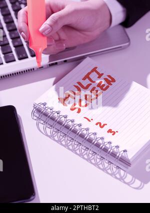 Hand writing sign Multi Screen, Business approach Having or involving several screen especially in a cinema Stock Photo