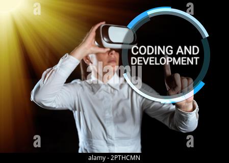 Handwriting text Coding And Development, Word for Programming Building simple assembly Programs Stock Photo