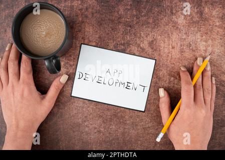 Hand writing sign App Development, Business idea producing computer software with a specialized purpose Stock Photo