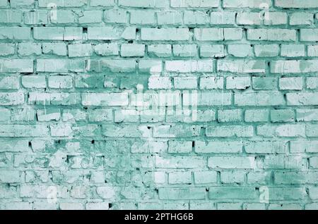 Square brick block wall background and texture. Painted in green Stock Photo