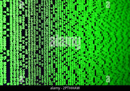 Macro of password selection on the monitor of the office computer. The concept of hacking the protection of a personal data keeper. The stream of supp Stock Photo