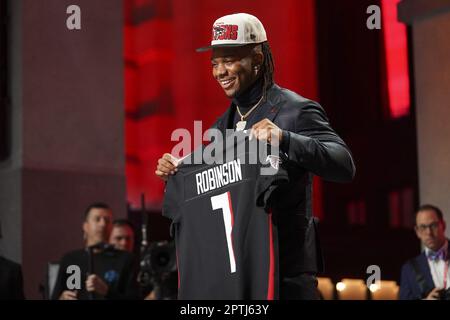 Atlanta Falcons first round draft pick Bijan Robinson speaks at an NFL  football press conference at the team's training facility in Flowery  Branch, Ga., on Friday, April 28, 2023. (AP Photo/Ben Gray