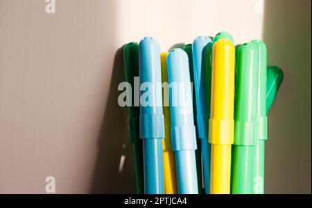 markers in blue, green and yellow Stock Photo